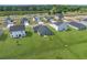 New construction neighborhood with tree-lined streets and manicured lawns at 57 Cape Point Dr., Conway, SC 29527