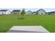 Backyard featuring green lawn with new homes at 57 Cape Point Dr., Conway, SC 29527