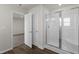 Modern bathroom with a glass-enclosed shower, sleek fixtures, and tile flooring for a luxurious feel at 57 Cape Point Dr., Conway, SC 29527