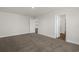 Spacious bedroom featuring plush carpet, neutral walls, and white trim for a clean, modern aesthetic at 57 Cape Point Dr., Conway, SC 29527