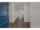 Inviting entryway with wood-look floors, neutral paint, and abundant natural light at 57 Cape Point Dr., Conway, SC 29527