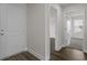 Entryway features luxury vinyl plank flooring and white doors at 57 Cape Point Dr., Conway, SC 29527