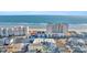 Aerial view of building, beach and oceanfront at 5709 N Ocean Blvd. # 303, North Myrtle Beach, SC 29582