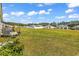 Expansive backyard with lush green grass, perfect for outdoor activities and relaxation at 589 Talisman Trail, Longs, SC 29568