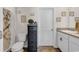 Bathroom with a single vanity, toilet, and framed decor, offering a clean and functional space at 589 Talisman Trail, Longs, SC 29568