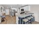 Lovely kitchen featuring stainless steel appliances, white cabinetry, breakfast bar with seating at 589 Talisman Trail, Longs, SC 29568