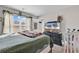Bright main bedroom with a comfortable bed, adjacent to an en-suite bathroom and a Bedroom, filled with natural light at 589 Talisman Trail, Longs, SC 29568