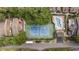 Aerial view of tennis court and pool; community features at 611 S 13Th Ave. # 175, Surfside Beach, SC 29575