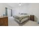 Spacious bedroom with a king-size bed and access to a private balcony at 611 S 13Th Ave. # 175, Surfside Beach, SC 29575