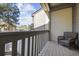 Relaxing deck space with wicker chair, overlooking the backyard at 611 S 13Th Ave. # 175, Surfside Beach, SC 29575