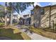 Exterior view showing the townhome's walkway, landscaping, and building architecture at 611 S 13Th Ave. # 175, Surfside Beach, SC 29575