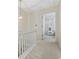 Upstairs hallway leading to bedrooms, featuring carpeted floors at 611 S 13Th Ave. # 175, Surfside Beach, SC 29575