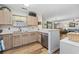 Kitchen with stainless steel dishwasher and a breakfast bar at 611 S 13Th Ave. # 175, Surfside Beach, SC 29575