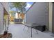 Private patio with a table and storage space, nestled between buildings at 611 S 13Th Ave. # 175, Surfside Beach, SC 29575