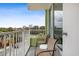 Relaxing balcony with two chairs and street view at 7000 N Ocean Blvd. # 326, Myrtle Beach, SC 29572