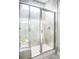 Bathroom with a large walk-in shower with glass doors at 711 Isle Verde Dr, Myrtle Beach, SC 29579