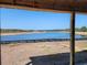 Serene view of a pond and lush greenery from under construction home at 711 Isle Verde Dr, Myrtle Beach, SC 29579