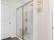 Clean bathroom with a walk-in shower and built-in storage at 719 Treaty Ct., Myrtle Beach, SC 29588