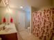 Bathroom with double vanity, shower/tub combo, and updated fixtures at 788 Rambler Ct., Myrtle Beach, SC 29588