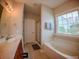 Clean bathroom with bathtub, shower, and double vanity at 788 Rambler Ct., Myrtle Beach, SC 29588