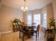 Bright dining area with a round table and chairs, plus large windows at 788 Rambler Ct., Myrtle Beach, SC 29588