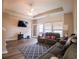 Living room with hardwood floors, sliding glass doors, and comfortable seating at 788 Rambler Ct., Myrtle Beach, SC 29588