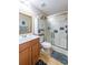 Well-lit bathroom features a wood vanity, shower with glass doors, and a mirrored medicine cabinet at 801 Benchmade Rd., Conway, SC 29527
