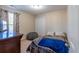 Bedroom featuring a large window, a dresser, a soft gray beanbag chair, and a bed at 801 Benchmade Rd., Conway, SC 29527