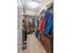 Walk-in closet with ample hanging space, shelving, and drawers for organized storage at 801 Benchmade Rd., Conway, SC 29527