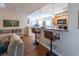 Open-concept living area with a breakfast bar and cozy seating, perfect for modern living and entertaining at 801 Benchmade Rd., Conway, SC 29527