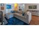 Spacious living room featuring a large sectional sofa, complemented by a blue rug and stylish decor at 801 Benchmade Rd., Conway, SC 29527