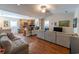 Open-concept living space blending living room and kitchen areas with seating and modern appliances at 801 Benchmade Rd., Conway, SC 29527