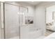Modern bathroom with glass shower and soaking tub at 886 Foxtail Dr. # C-39, Longs, SC 29568