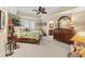 Spacious bedroom featuring a ceiling fan, a comfortable bed, and well-placed decorations at 9547 Edgerton Dr. # 606, Myrtle Beach, SC 29572