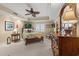 Cozy bedroom with a ceiling fan, decorative pillows, and a comfortable bed at 9547 Edgerton Dr. # 606, Myrtle Beach, SC 29572