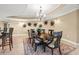 View of the dining room showcasing decorative lighting, table, and chairs at 9547 Edgerton Dr. # 606, Myrtle Beach, SC 29572
