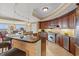 Well appointed kitchen with stainless appliances, granite countertops, and breakfast bar at 9547 Edgerton Dr. # 606, Myrtle Beach, SC 29572
