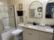 Bathroom boasts double sinks, granite counters, and a shower/tub at 9764 Leyland Dr. # 7, Myrtle Beach, SC 29572