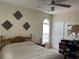 Spacious bedroom with a ceiling fan and large windows at 9764 Leyland Dr. # 7, Myrtle Beach, SC 29572