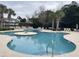 Resort-style pool with surrounding lounge chairs at 9764 Leyland Dr. # 7, Myrtle Beach, SC 29572