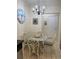 Dining area with glass table and four chairs at 9764 Leyland Dr. # 7, Myrtle Beach, SC 29572