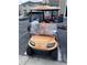 Orange golf cart parked in a parking lot at 9764 Leyland Dr. # 7, Myrtle Beach, SC 29572