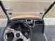 Golf cart interior with steering wheel and dashboard at 9764 Leyland Dr. # 7, Myrtle Beach, SC 29572