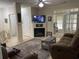 Living room with fireplace and access to sunroom at 9764 Leyland Dr. # 7, Myrtle Beach, SC 29572
