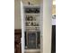 Built-in wet bar with mini-fridge and shelving at 9764 Leyland Dr. # 7, Myrtle Beach, SC 29572