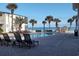 Relaxing pool area with ocean views and lounge chairs at 1 Norris Dr. # 219, Pawleys Island, SC 29585