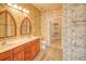 Double vanity bathroom with tiled floors and a separate shower at 113 Knight Circle # 2, Pawleys Island, SC 29585