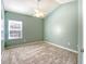 Spacious bedroom with light walls and carpeted floor at 113 Knight Circle # 2, Pawleys Island, SC 29585