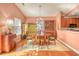 Charming dining room featuring hardwood floors and a wood dining set at 113 Knight Circle # 2, Pawleys Island, SC 29585
