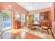 Bright dining area with hardwood floors and access to the backyard at 113 Knight Circle # 2, Pawleys Island, SC 29585